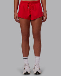 Woman wearing Accelerate Run Shorts - Scarlet | Set:true | Angle:front | Model:Charlize | Size:S