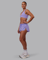 Woman wearing Accelerate 3" Running Short - Violet Ray | Model:Charlize | Size:S