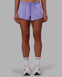 Woman wearing Accelerate 3" Running Short - Violet Ray | Model:Charlize | Size:S