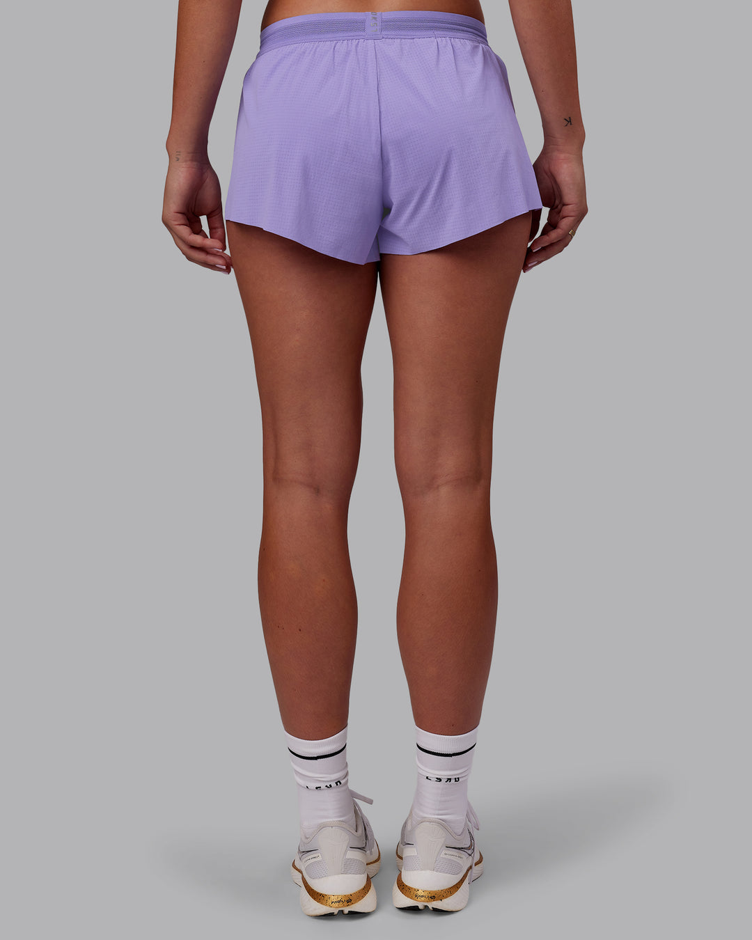 Woman wearing Accelerate 3&quot; Running Short - Violet Ray | Model:Charlize | Size:S