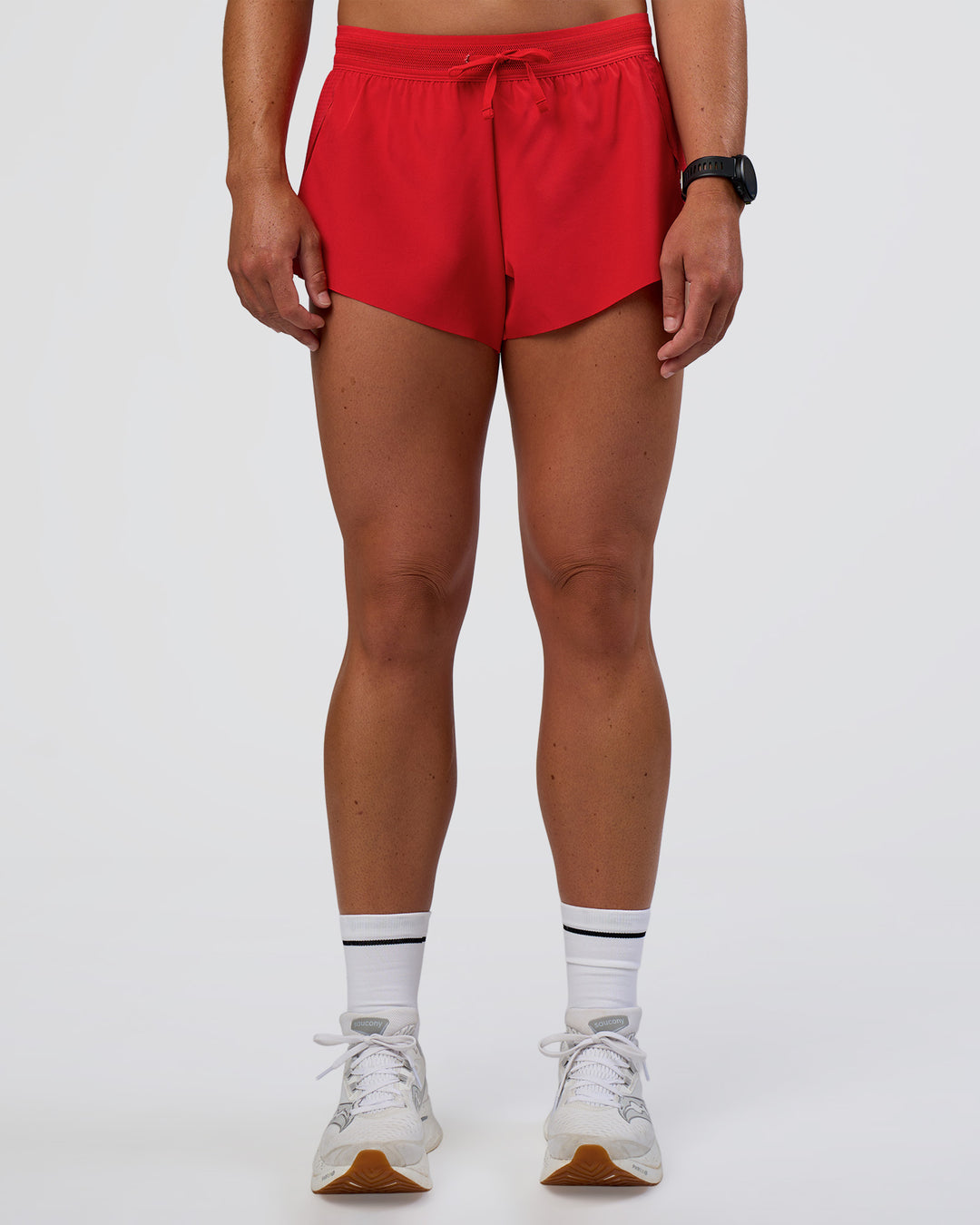 Woman wearing Accelerate 3&quot; Mid-Rise Running Short - Flame | Model:Sav | Size:S