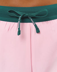 Woman wearing Accelerate 3" Mid-Rise Running Short - Transformative Teal-Marshmallow | Model:Amity | Size:S