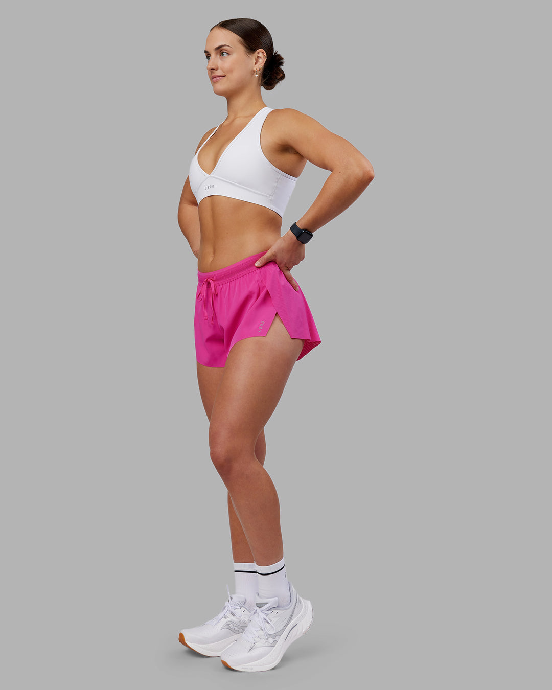 Woman wearing Accelerate 3&quot; Running Short - Ultra Pink | Model:Keisha | Size:S