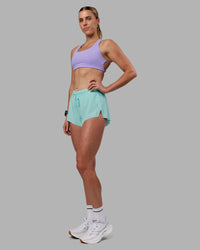 Woman wearing Accelerate 3" Running Short - Island Paradise | Model:Shae | Size:S