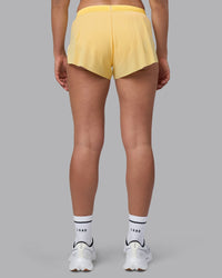 Woman wearing Accelerate 3" Running Short - Lemon | Model:Sophie | Size:S