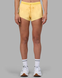 Woman wearing Accelerate 3" Running Short - Lemon | Model:Sophie | Size:S