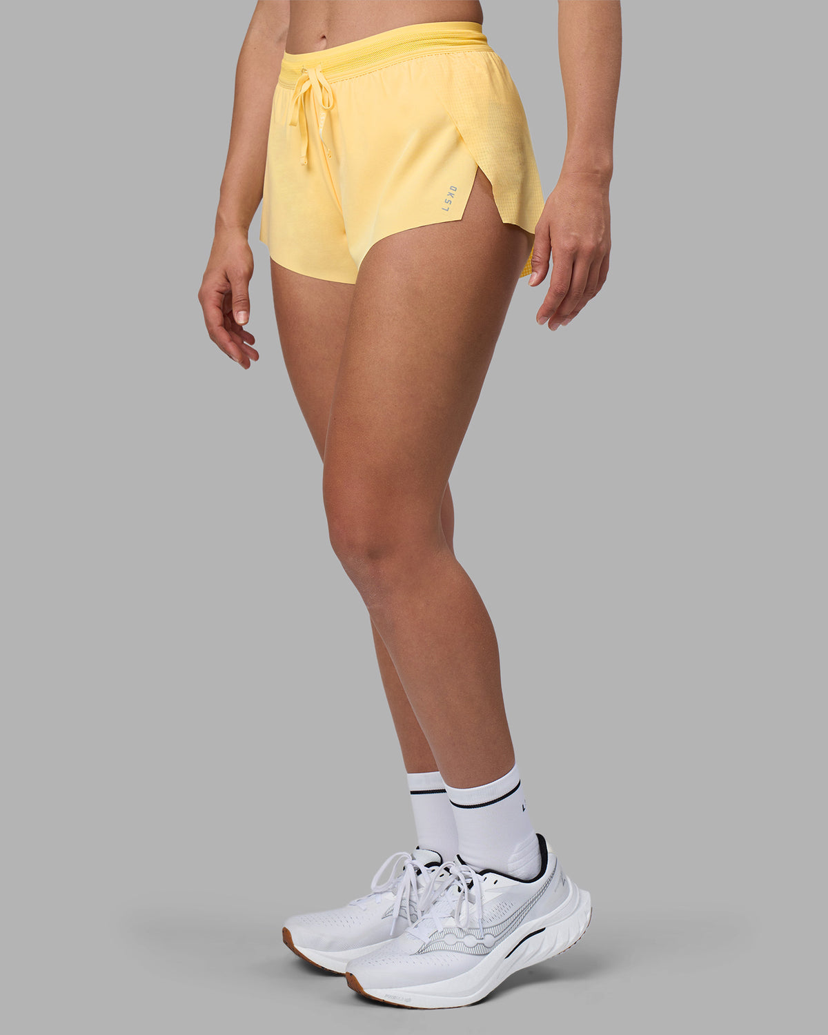 Woman wearing Accelerate 3" Running Short - Lemon | Model:Sophie | Size:S