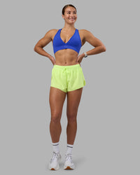 Woman wearing Accelerate 3" Running Short - Lime Glo | Model:Hannah | Size:S