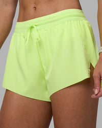 Woman wearing Accelerate 3" Running Short - Lime Glo | Model:Hannah | Size:S