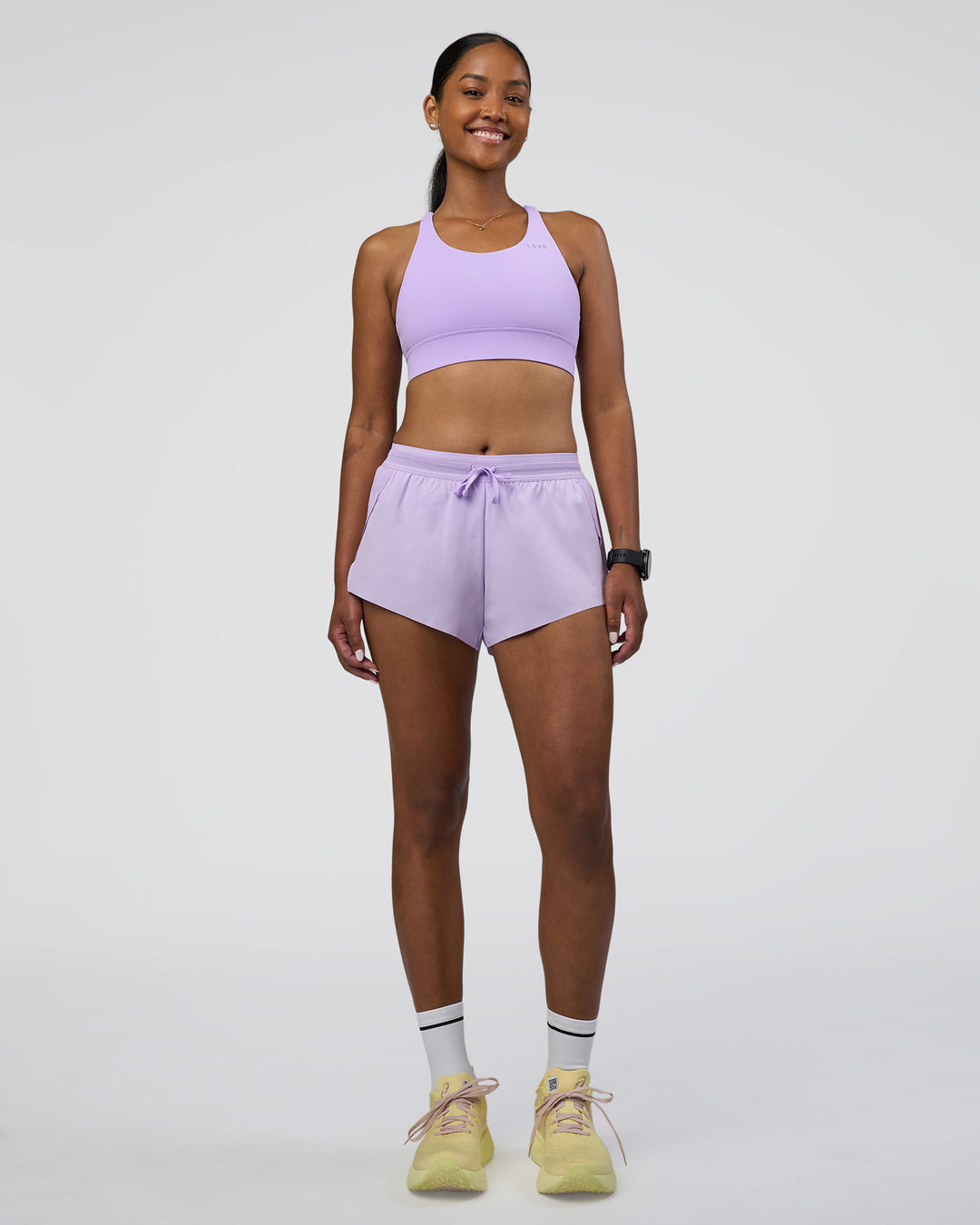 Woman wearing Accelerate 3&quot; Running Short - Pale Lilac | Model:Rica | Size:S