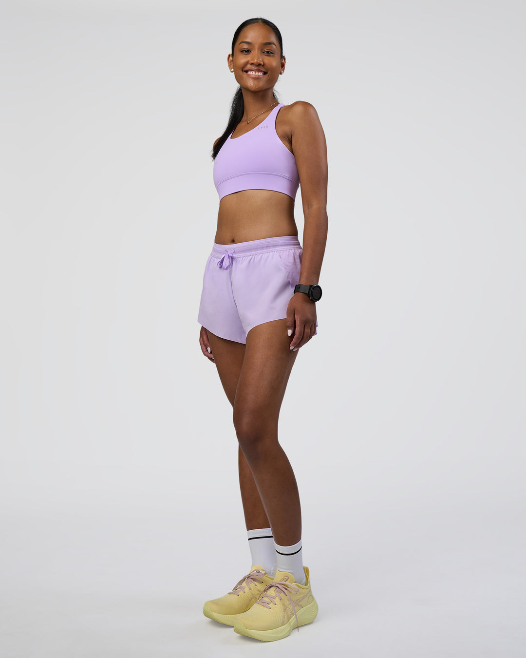 Woman wearing Accelerate 3&quot; Running Short - Pale Lilac | Model:Rica | Size:S