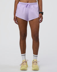 Woman wearing Accelerate 3" Running Short - Pale Lilac | Set:true | Angle:front | Model:Rica | Size:S