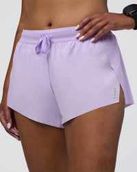Woman wearing Accelerate 3" Running Short - Pale Lilac | Set:true | Angle:closeup | Model:Rica | Size:S