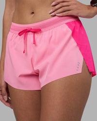 Woman wearing Accelerate 3" Running Short - Ultra Pink-Candy Pink | Set:true | Angle:closeup | Model:Rhiley | Size:S