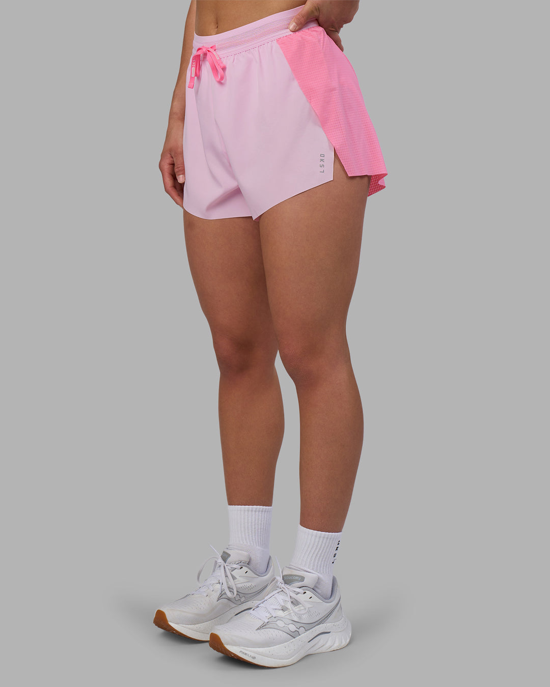 Woman wearing Accelerate 3&quot; High-Rise Running Short - Candy Pink-Marshmallow | Model:Keisha | Size:S