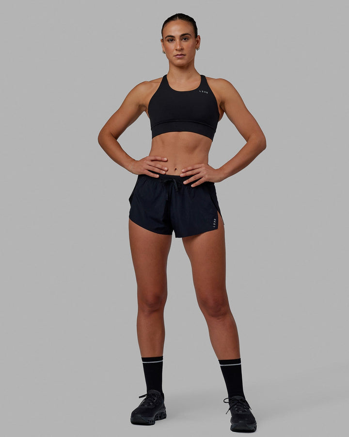 Woman wearing Accelerate Run Shorts - Black