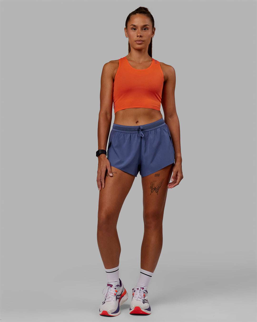 Woman wearing Accelerate Run Shorts - Future Dusk