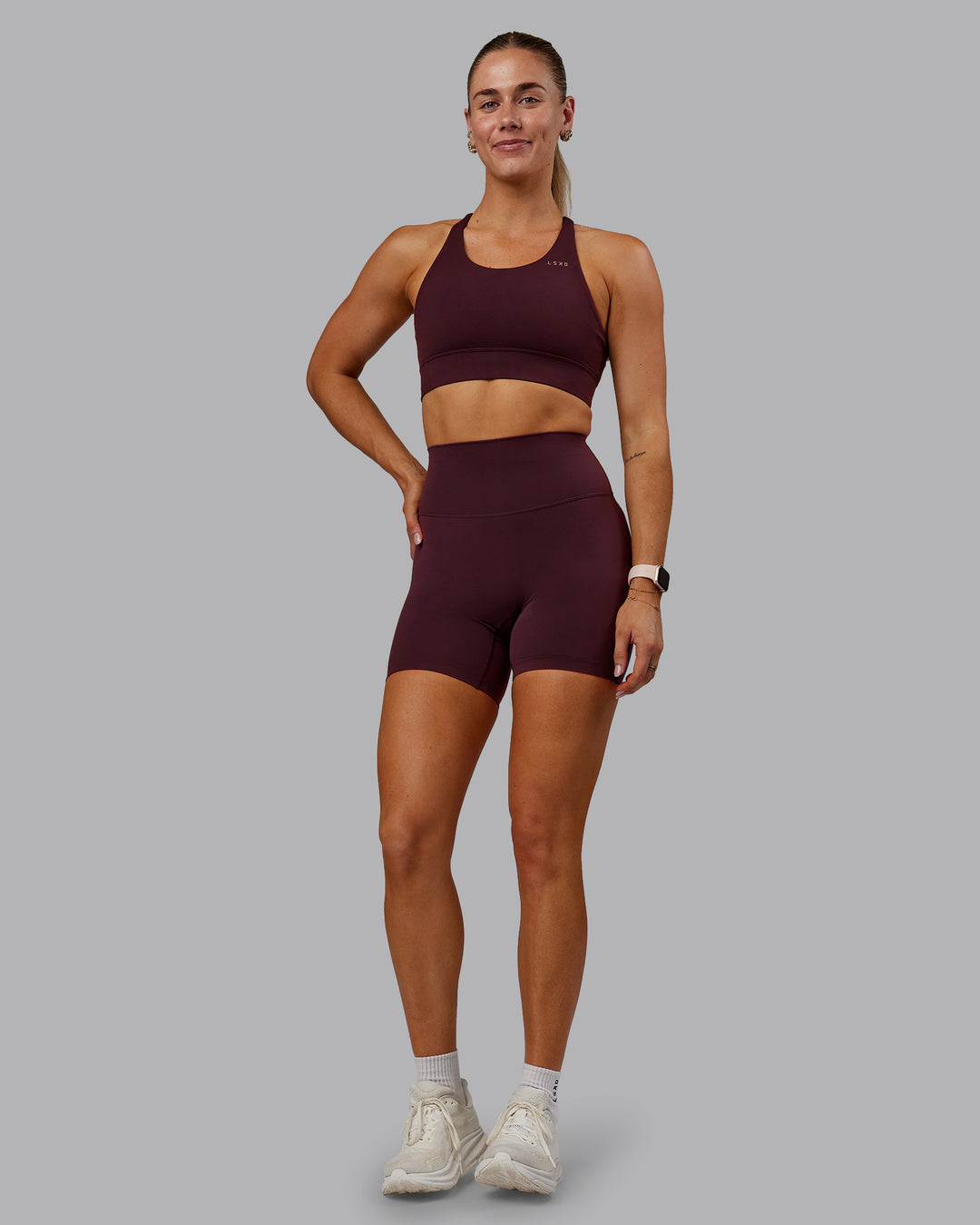 Woman wearing Accelerate Sports Bra - Cherry Lacquer | Model:Hannah | Size:S