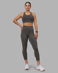 Woman wearing Accelerate Sports Bra - Dark Storm | Model:Keisha | Size:S
