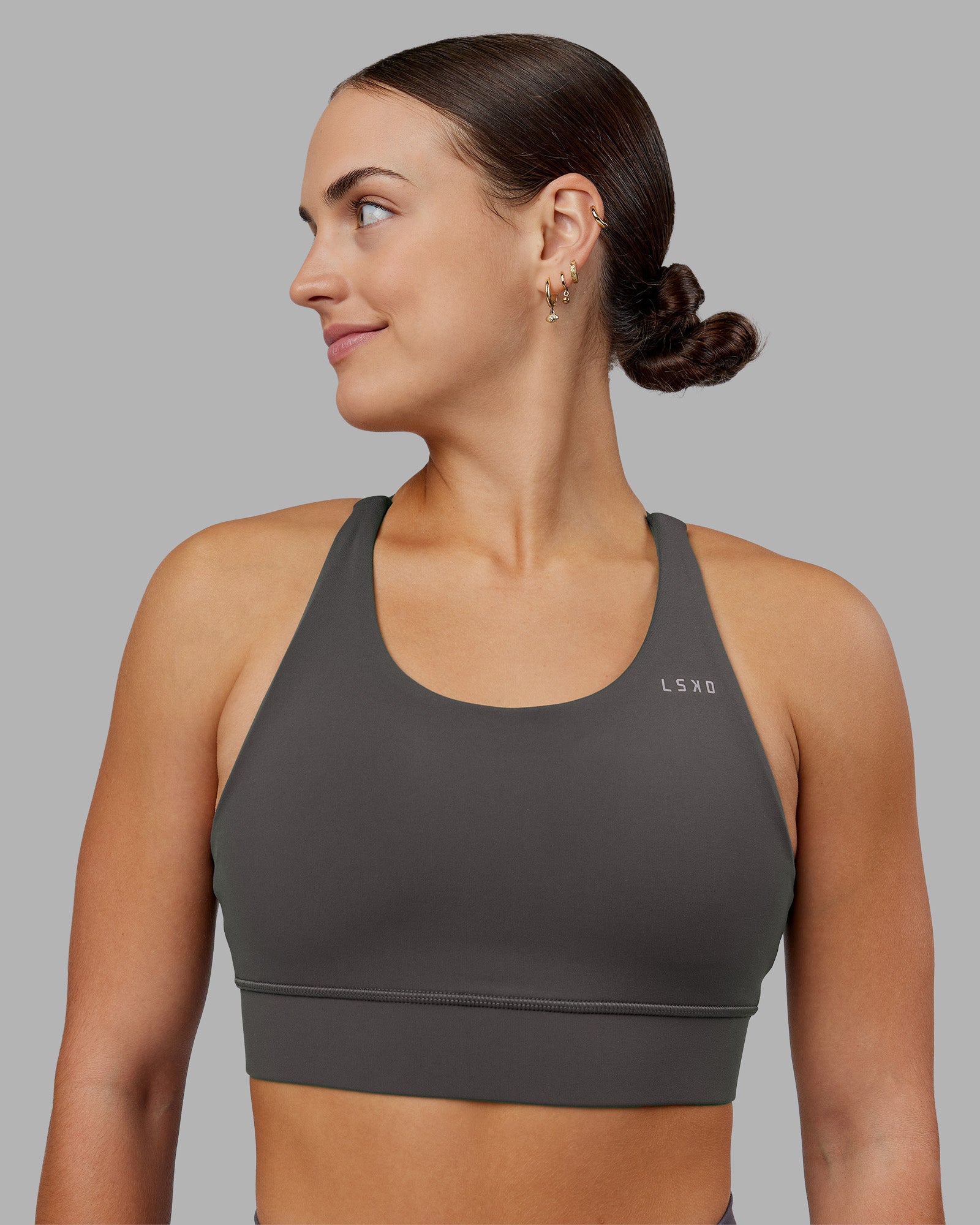 Woman wearing Accelerate Sports Bra - Dark Storm | Model:Keisha | Size:S