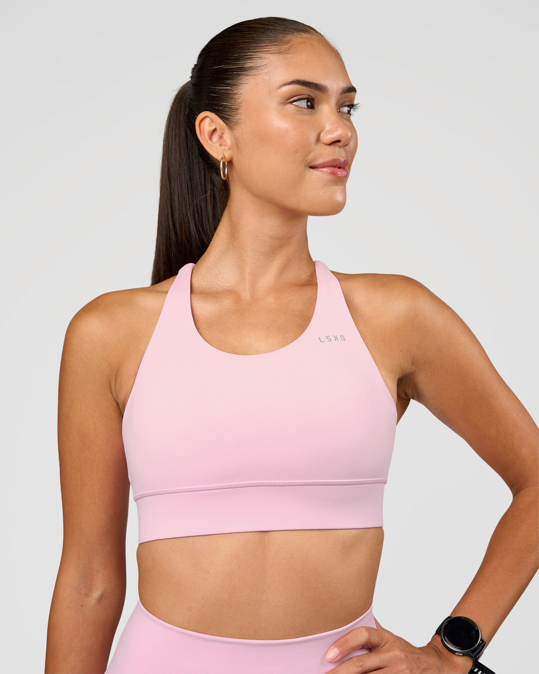 Woman wearing Accelerate Sports Bra - Marshmallow | Set:true | Angle:front | Model:Rhiley | Size:S