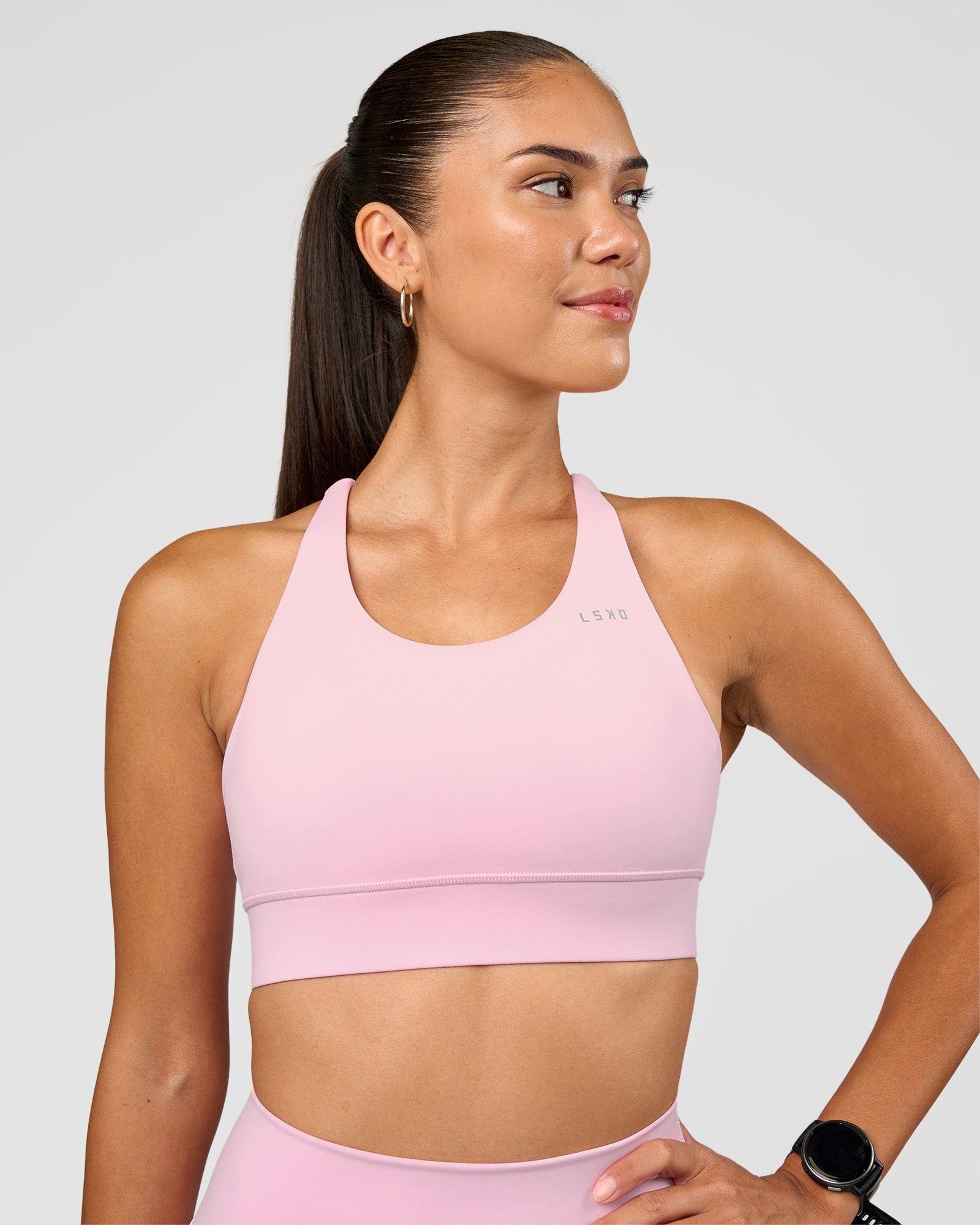 Woman wearing Accelerate Sports Bra - Marshmallow | Set:true | Angle:front | Model:Rhiley | Size:S
