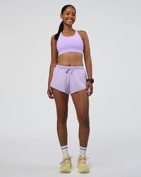 Woman wearing Accelerate Sports Bra - Pale Lilac | Model:Rica | Size:S