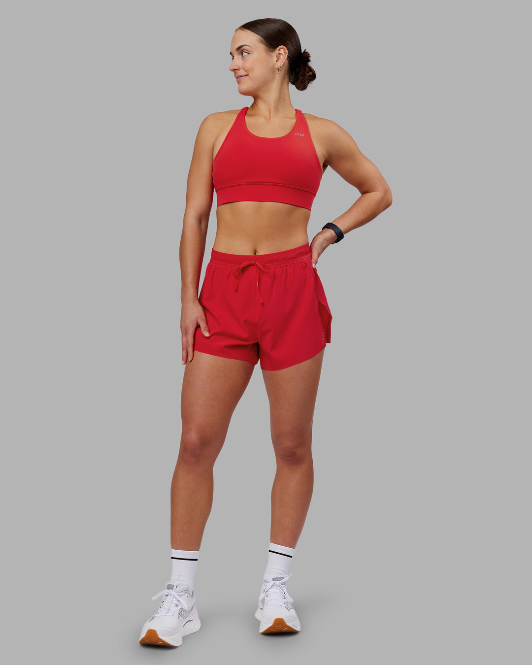 Woman wearing Accelerate Sports Bra - Scarlet | Model:Keisha | Size:S