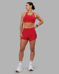 Woman wearing Accelerate Sports Bra - Scarlet | Model:Keisha | Size:S