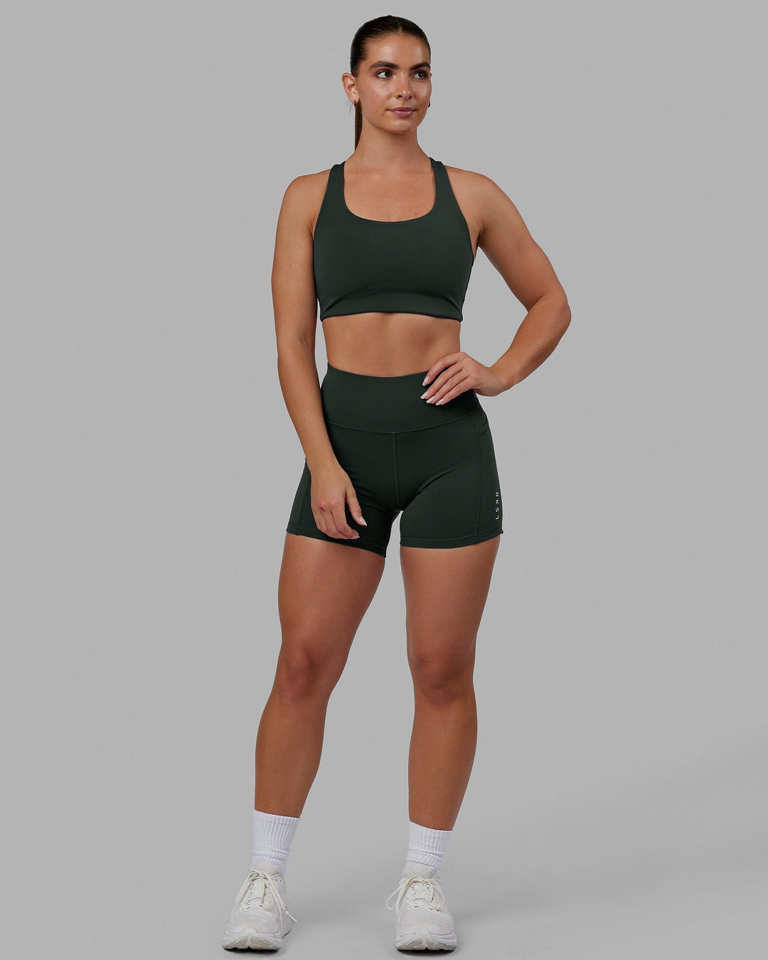 Woman wearing Ace Long Line Bra - Vital Green