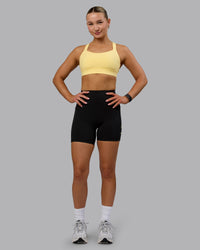 Woman wearing Advance Sports Bra - Lemon