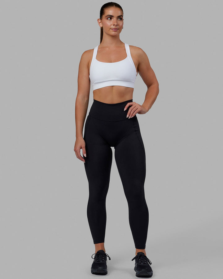 Woman wearing Advance Sports Bra - White