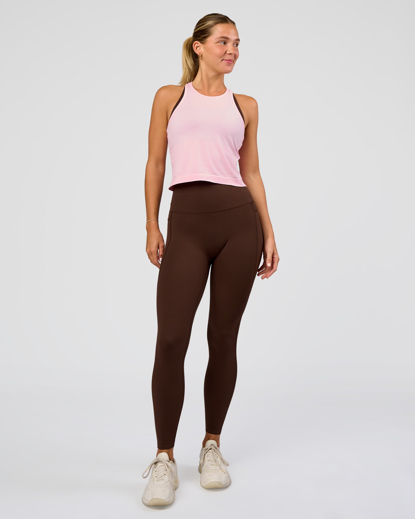 Woman wearing AeroFLX+ Seamless Flow Skimmer Tank - Marshmallow/Marshmallow | Model:Amity | Size:S