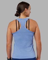 Woman wearing AeroFLX+ Seamless Tank - Cornflower Blue Marl | Model:Keisha | Size:S