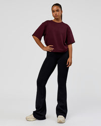 Woman wearing AfterDark ZeroCrease Cropped Tee - Cherry Lacquer | Model:Sophia | Size:S