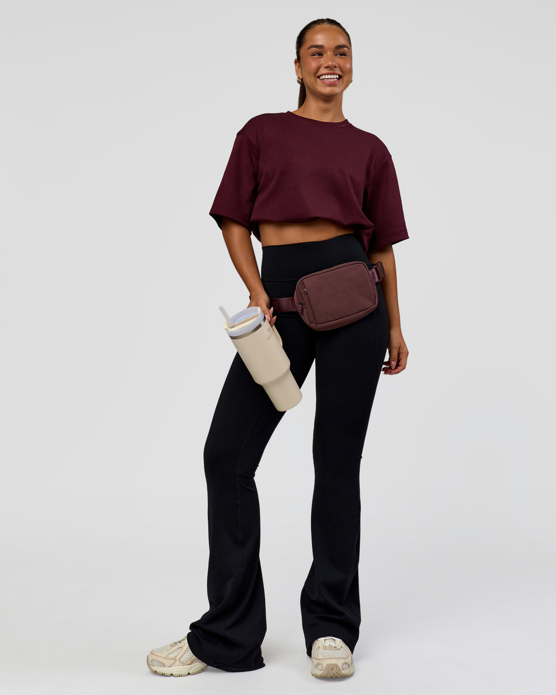 Woman wearing AfterDark ZeroCrease Cropped Tee - Cherry Lacquer | Model:Sophia | Size:S