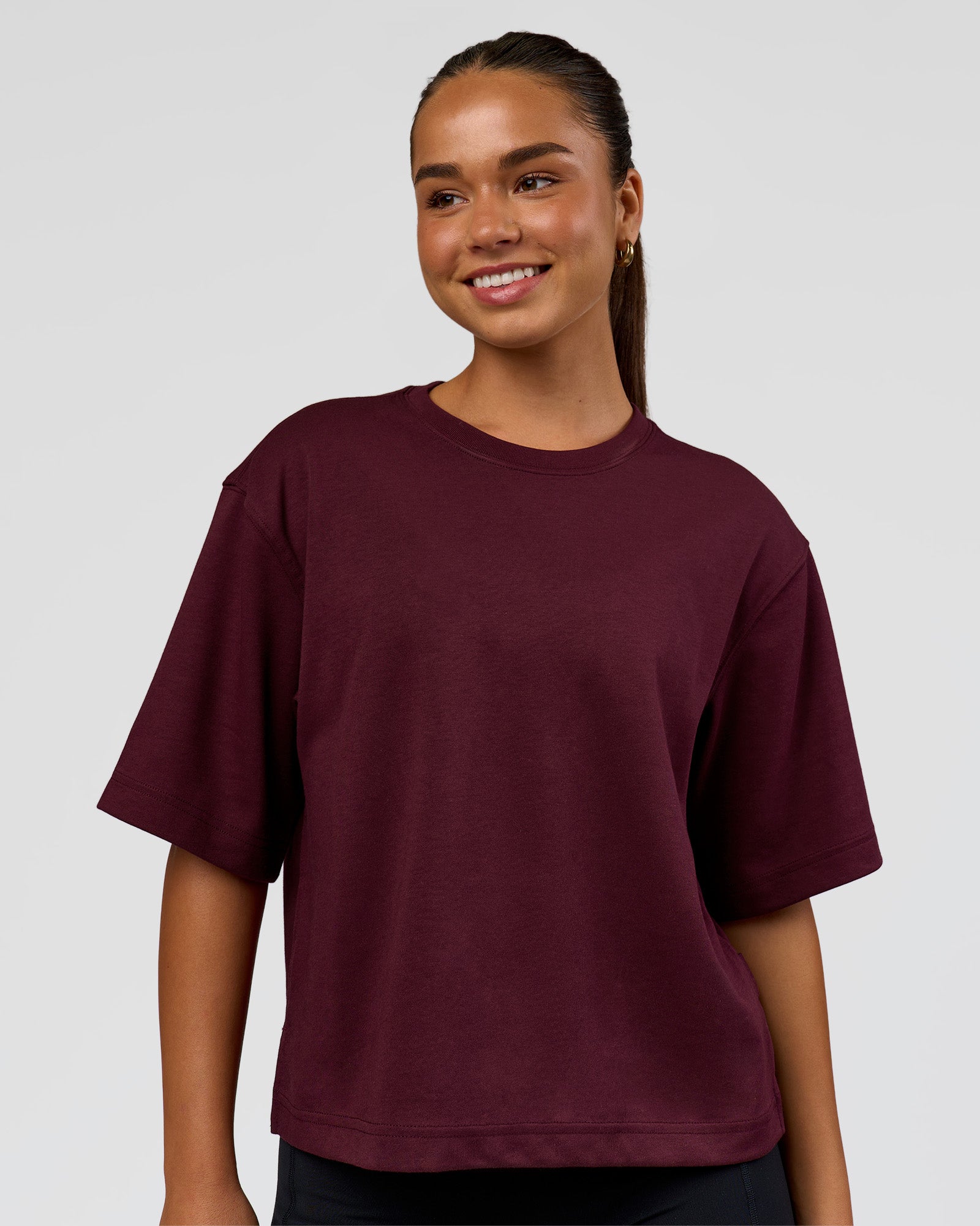 Woman wearing AfterDark ZeroCrease Cropped Tee - Cherry Lacquer | Model:Sophia | Size:S