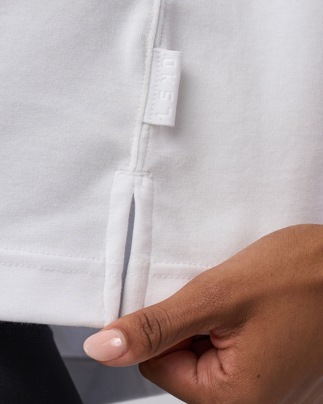 Woman wearing AfterDark ZeroCrease Cropped Tee - White | Model:Tomi | Size:S