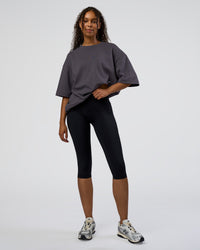 Woman wearing AfterDark ZeroCrease Oversized Tee - Dark Storm | Model:Jordan | Size:S