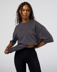 Woman wearing AfterDark ZeroCrease Oversized Tee - Dark Storm | Model:Jordan | Size:S