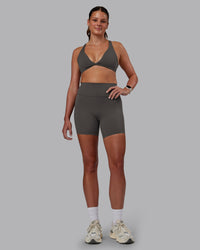 Woman wearing Agile Sports Bra - Dark Storm | Model:Phoebe | Size:S