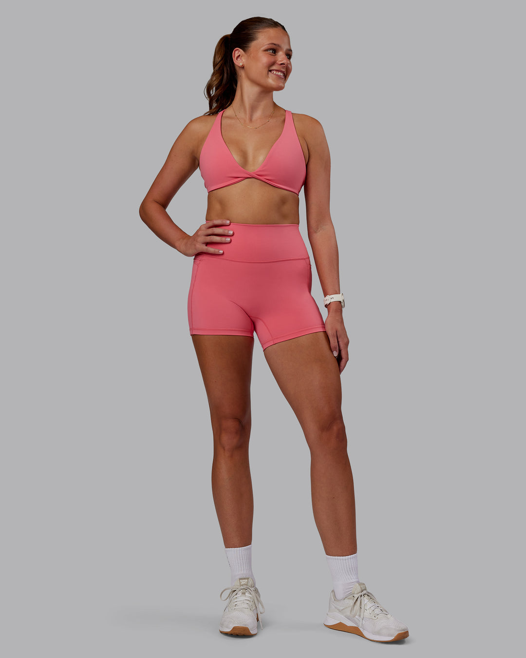 Woman wearing Agile Sports Bra - Pink Lemonade | Model:Phoebe | Size:S