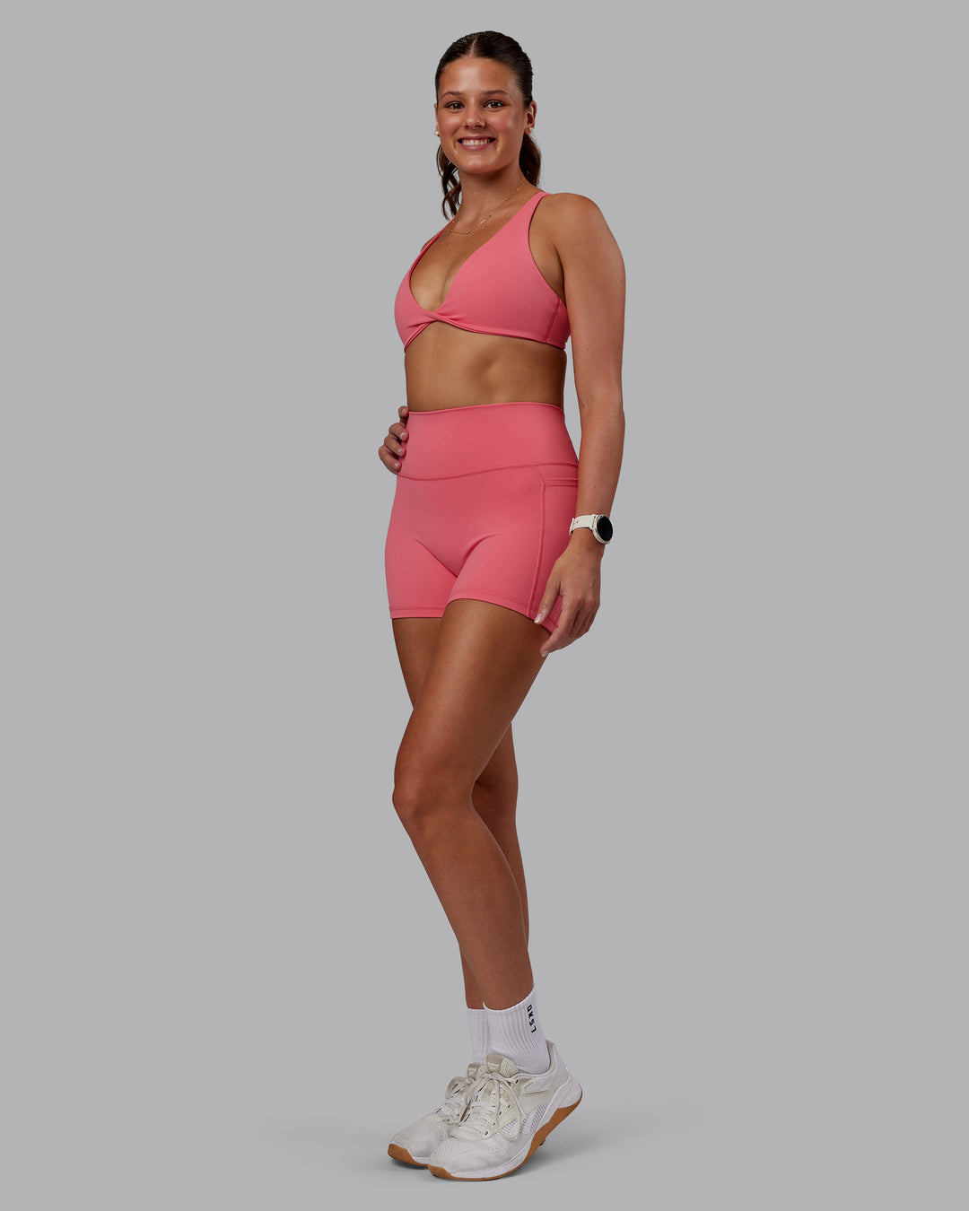 Woman wearing Agile Sports Bra - Pink Lemonade | Model:Phoebe | Size:S
