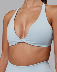 Woman wearing Agile Sports Bra - Skyride | Model:Rhiley | Size:S