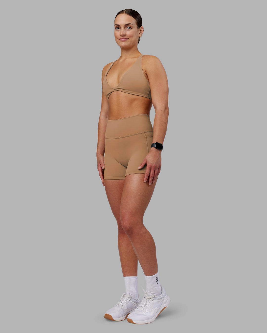 Woman wearing Agile Sports Bra - Warm Smoke | Model:Keisha | Size:S - view 5