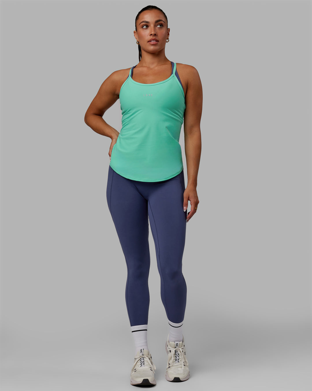 Woman wearing Agility Active Tank - Aquatic Awe