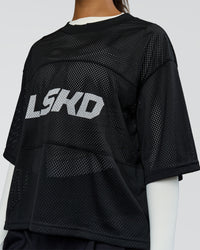 Woman wearing AirCore Jersey - Black-Black | Model:Rosie | Size:S