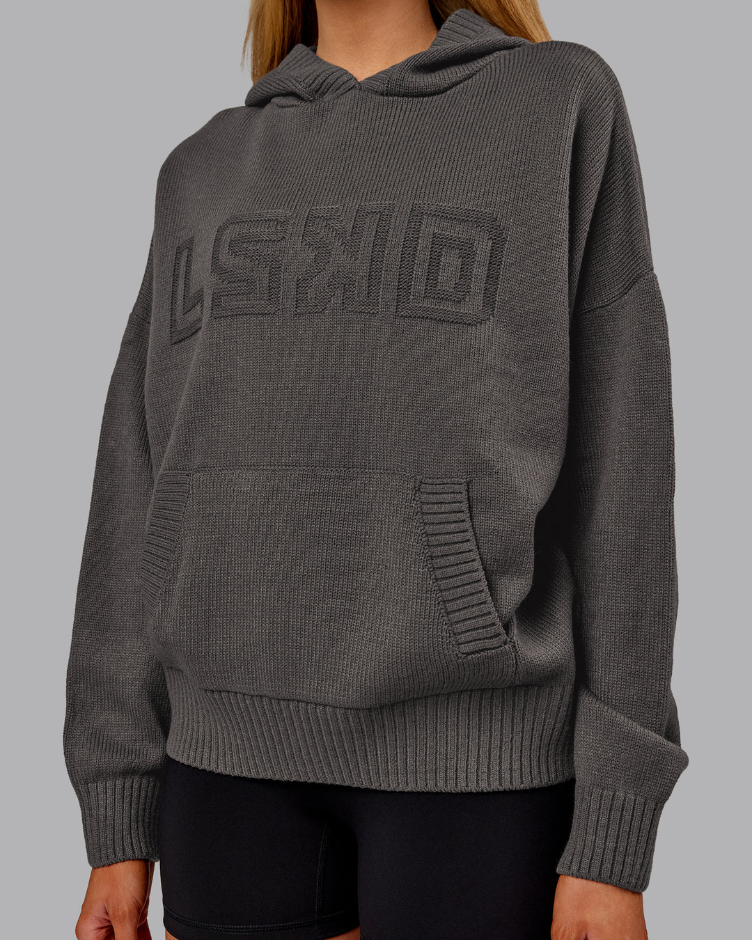 Woman wearing All Day Active Knitted Hoodie - Dark Storm | Model:Ella | Size:S