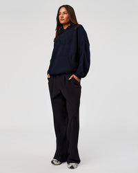 Woman wearing All Day Active Knitted Hoodie - Future Navy | Model:Bianca | Size:S