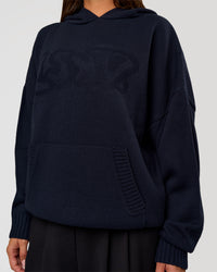 Woman wearing All Day Active Knitted Hoodie - Future Navy | Model:Bianca | Size:S